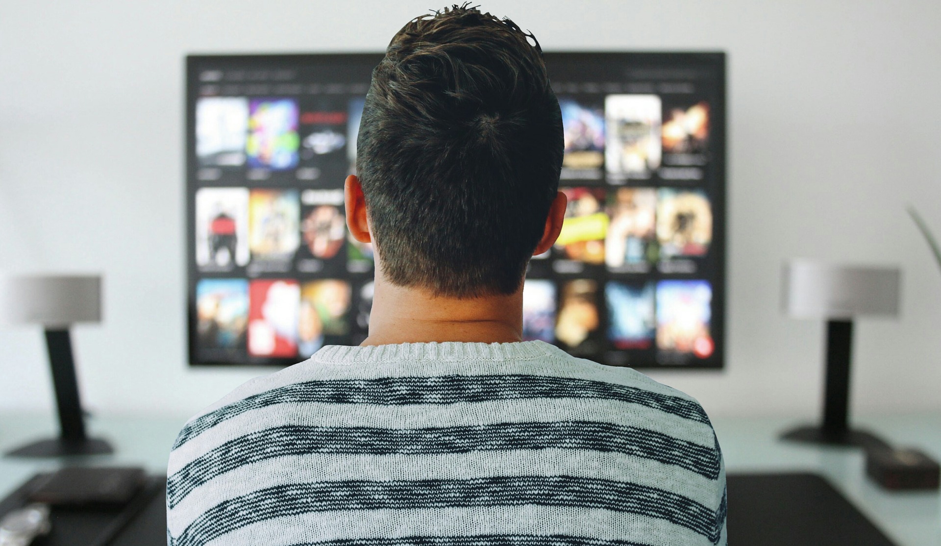 Man in front of TV