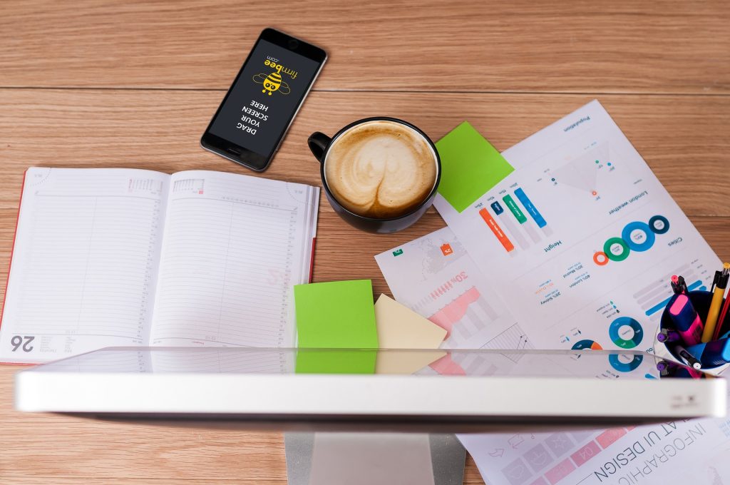 Desk with papers and coffee