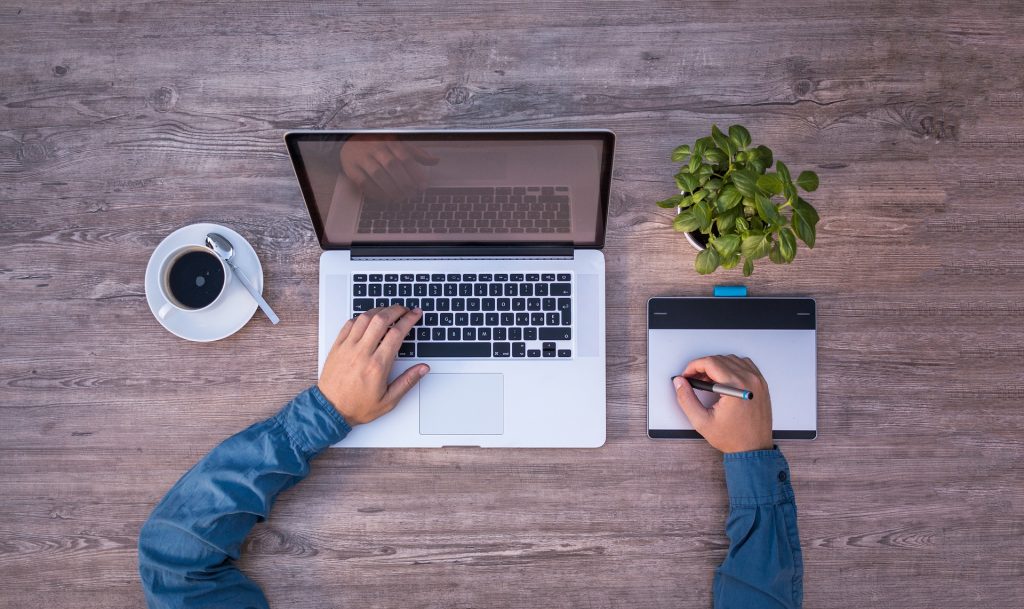 Man typing on a computer