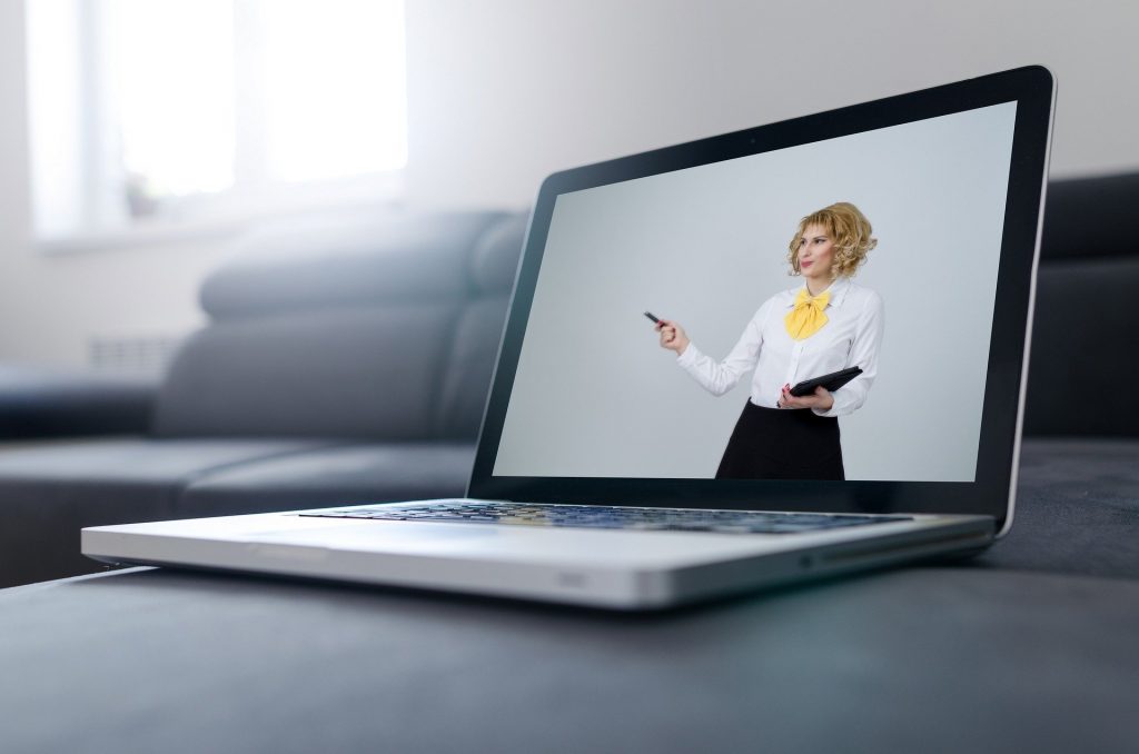 Woman presenting on a laptop